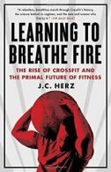 Learning to Breathe Fire: The Rise of Crossfit . Herz Paperback<|
