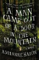 A man came out of a door in the mountain: a novel by Adrianne Harun (Paperback